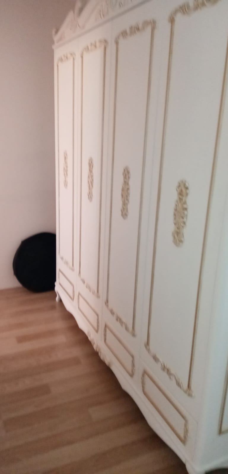 Wardrobe with Gold Details