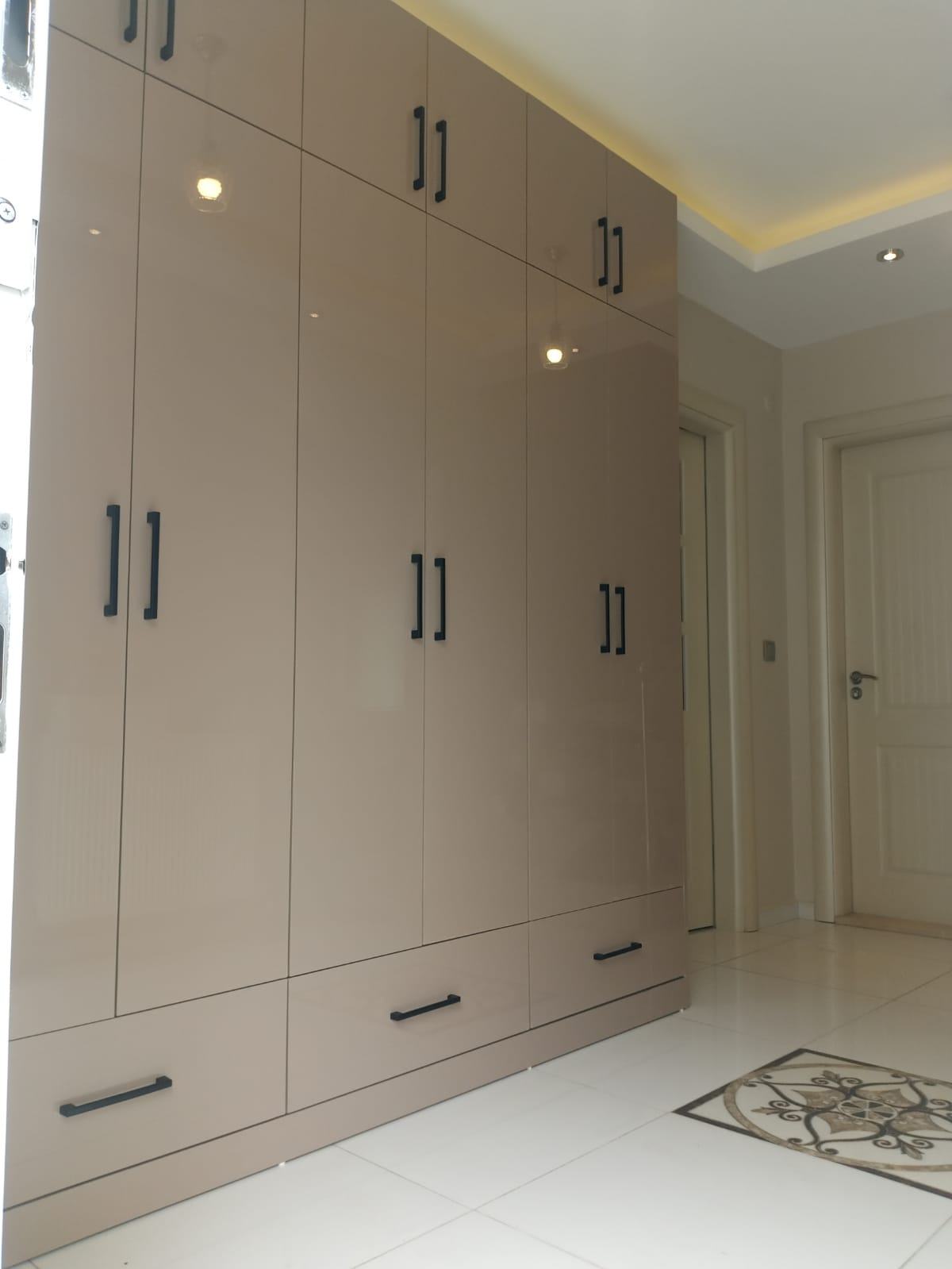 Glossy Beige Coat Rack Cabinet