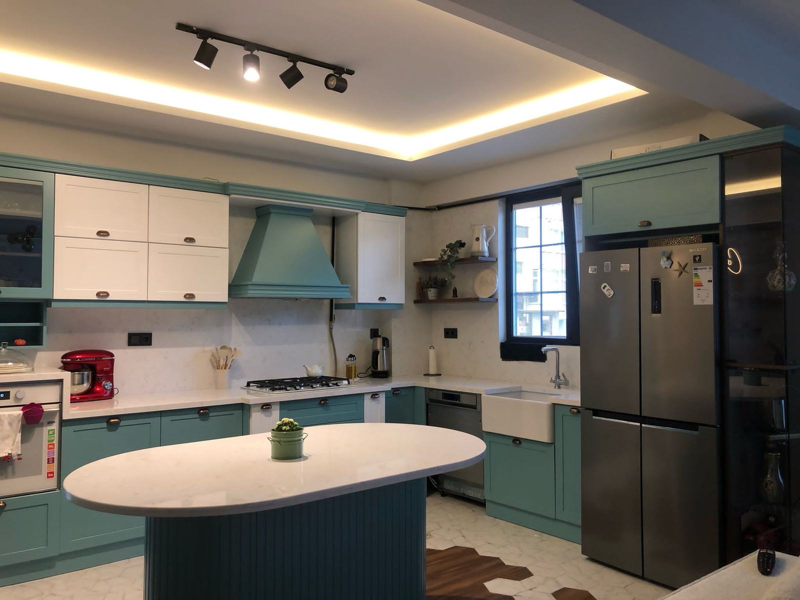 Green and White Kitchen Cabinets
