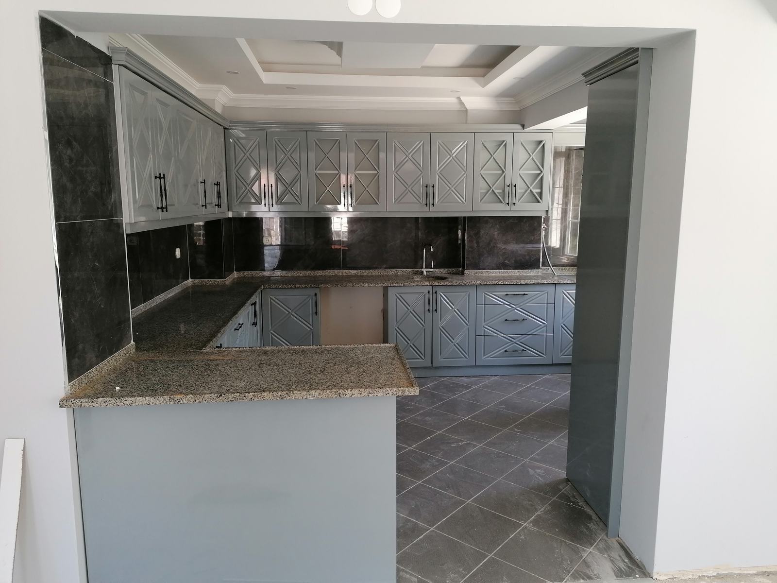 Gray and Embroidered Kitchen Cabinet