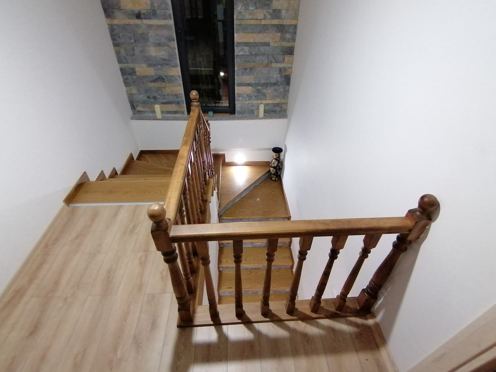 Staircase with Wooden Railing